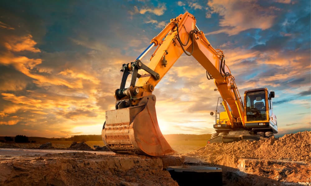 Equipment lined up across the dealership yard