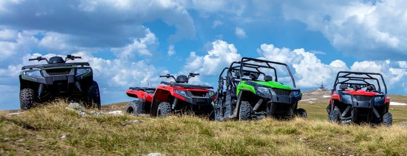 Equipment lined up across the dealership yard
